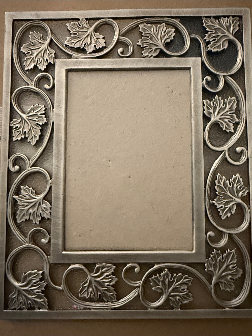 Decorative Leaf Scroll Photo Frame - Holds a
4”x5”Photo - Silver